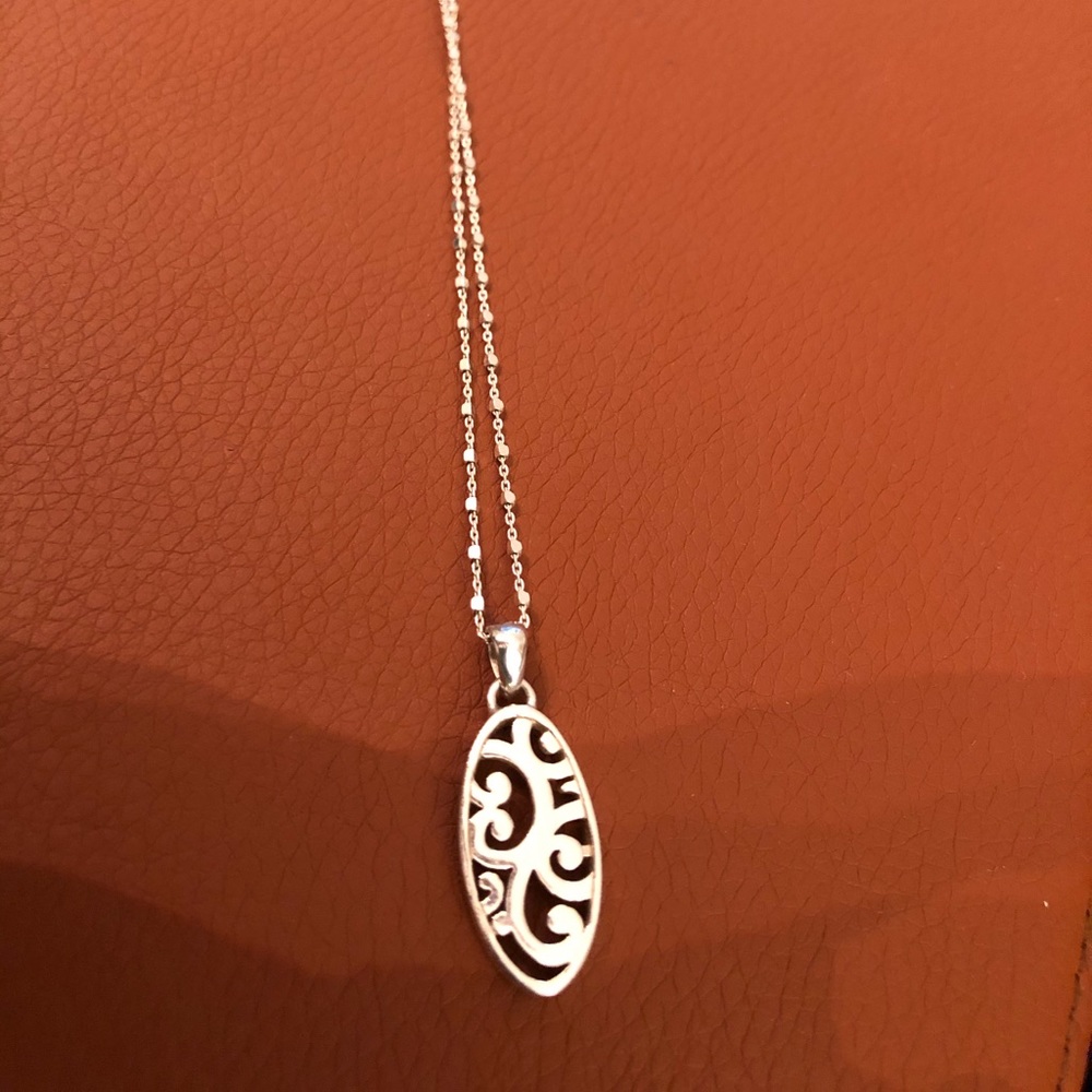 Sterling silver necklace with filigree charm